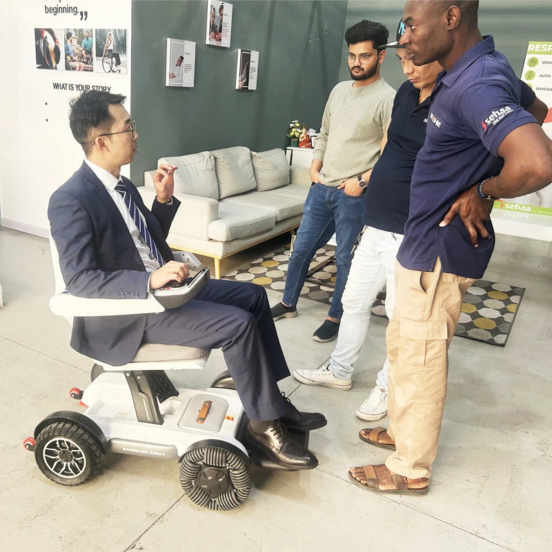 2025 Hot Sale Medical Lightweight Folding Electric Wheelchair For Elderly Remote Control Lithium Battery